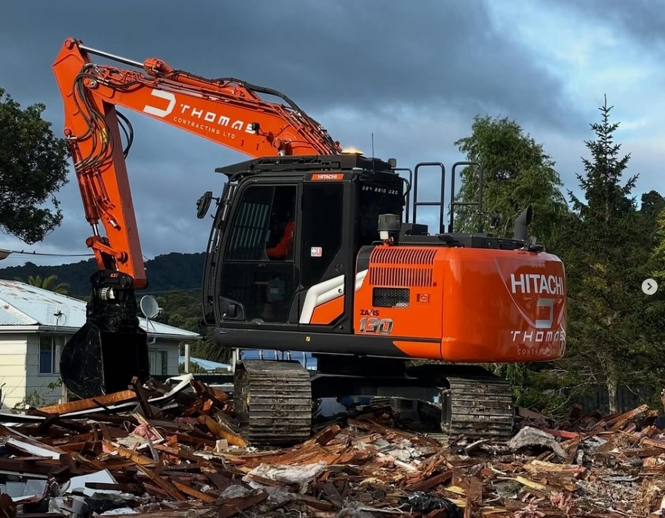 DT Contracting excavator completing demolition work